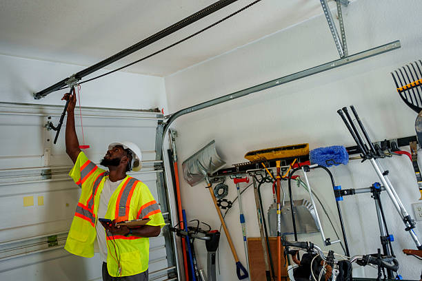 Professional Garage Door Panel Replacement technician working in Hampton Bays, NY